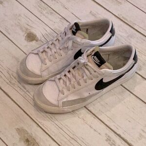 Nike Blazer low women’s 11, men’s 9.5 White and Black Sneakers
